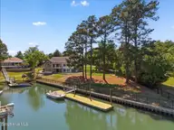 304 Gull Road, Hampstead, NC 28443 — 3-bedroom waterfront home in Olde Point, Hampstead, NC, photo 4 of 50: 49-DJI_20260420143233_0199_D-Edit