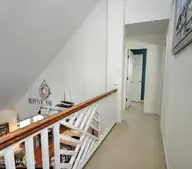 39 Lee Street, Ocean Isle Beach, NC 28469 — 4-bedroom waterfront home, Ocean Isle Beach, NC, photo 21 of 47: 2nd Floor Hallway
