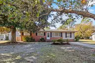 213 Woodland Drive, Wilmington, NC 28403 — 4-bedroom home in Pine Hills, Wilmington, NC, photo 2 of 40: 1_front exterior