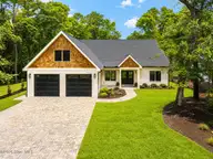 138 Mimosa Boulevard, Pine Knoll Shores, NC 28512 — 4-bedroom home in Pine Knoll Association, Pine Knoll Shores, NC, photo 1 of 50: Front of house