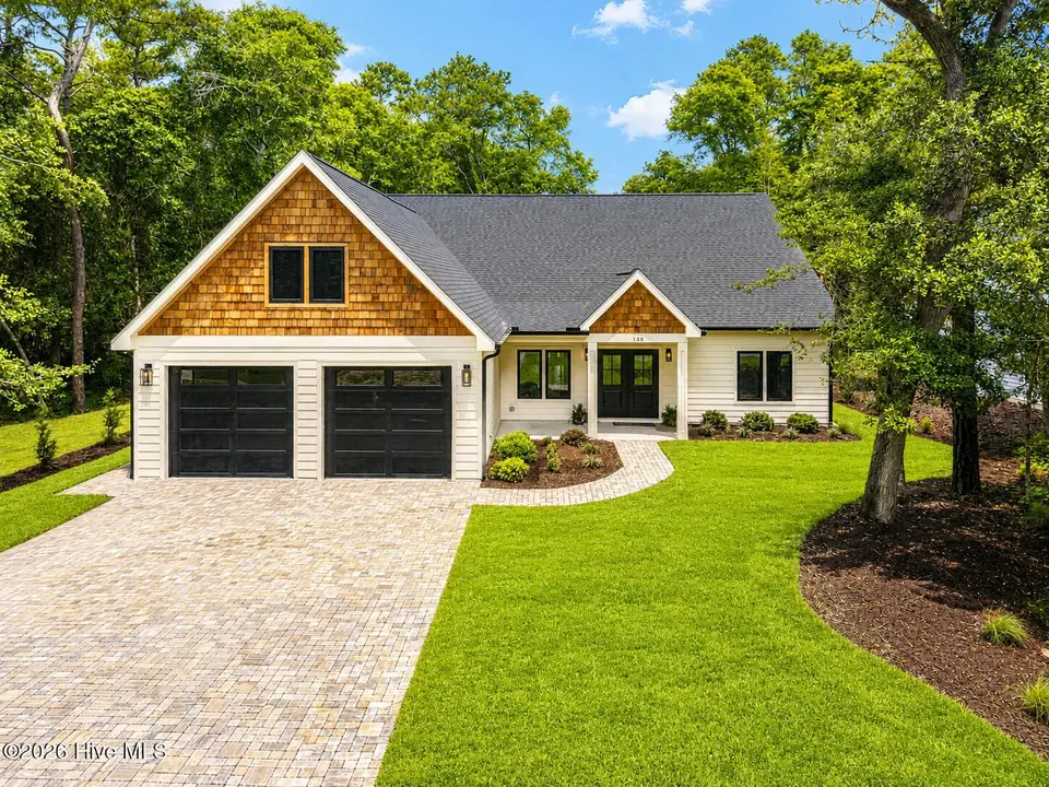 138 Mimosa Boulevard, Pine Knoll Shores, NC 28512 — 4-bedroom home in Pine Knoll Association, Pine Knoll Shores, NC, photo 1 of 50: Front of house