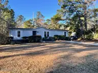 158 Champion Drive, Hampstead, NC 28443 — 3-bedroom manufactured home in Topsail Greens, Hampstead, NC, photo 1 of 10