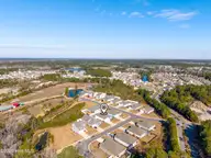 1155 Little Martha Way SE Lot 11, Bolivia, NC 28422 — 3-bedroom home in Avalon, Bolivia, NC, photo 8 of 60: 08-DJI_20260122113127_0115_D_1-HDR-Edit
