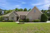 411 Oakmont Drive, Morehead City, NC 28557 — 3-bedroom home in Brandywine Bay, Morehead City, NC, photo 1 of 56: 1-web-or-mls-1S3A3752