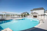 438 Hampton Colony Circle, North Topsail Beach, NC 28460 — 5-bedroom waterfront home in Hampton Colony, North Topsail Beach, NC, photo 24 of 24: HamptonColonypool7.2025L33A9542 copy