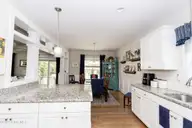 213 Creek View Circle, Sneads Ferry, NC 28460 — 4-bedroom waterfront home in Creeks Edge, Sneads Ferry, NC, photo 19 of 51: e kitchen:dining