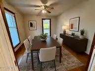 2454 Buckboard Trail, Rocky Mount, NC 27804 — 3-bedroom home in Old Carriage Estates, Rocky Mount, NC, photo 6 of 66: Staged Dining 2454 Buchboard