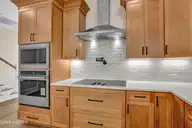 155 Everett Park Trail, Holly Ridge, NC 28445 — 3-bedroom waterfront home in Summerhouse On Everett Bay, Holly Ridge, NC, photo 8 of 39: Custom Cabinets