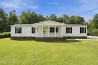 185 New Hope Lane SE, Leland, NC 28451 — 3-bedroom manufactured home, Leland, NC, photo 1 of 49: 47-web-or-mls-DSC06688