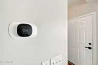 140 Crooked Run Drive, New Bern, NC 28560 — 3-bedroom home in Crooked Run, New Bern, NC, photo 24 of 35: Nest Thermostat
