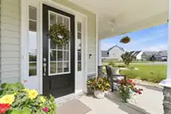 24 W Abaco Way, Hampstead, NC 28443 — 4-bedroom home in Sanctuary at Forest Sound, Hampstead, NC, photo 4 of 63: Front Porch & Entry