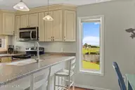 8801 Reed Drive 105 N, Emerald Isle, NC 28594 — 1-bedroom waterfront condo in Sound Of The Sea, Emerald Isle, NC, photo 6 of 37: Kitchen