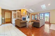 1461 S Shore Drive, Southport, NC 28461 — 3-bedroom waterfront home, Southport, NC, photo 13 of 75: Living Room Lookin Out