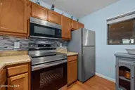 1840 New River Inlet Road 2308, North Topsail Beach, NC 28460 — 2-bedroom waterfront condo in Topsail Dunes, North Topsail Beach, NC, photo 17 of 44: Kitchen