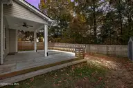 205 Peggys Trace, Sneads Ferry, NC 28460 — 5-bedroom home in Peggys Cove Southbridge, Sneads Ferry, NC, photo 3 of 46: Backyard Deck Lighting