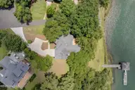 112 Coastal Bluffs Court, Hampstead, NC 28443 — 4-bedroom waterfront home in Olde Point, Hampstead, NC, photo 4 of 37: Overhead 112