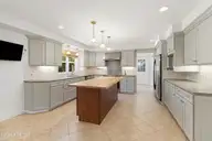 117 Hodges Street, Morehead City, NC 28557 — 4-bedroom home in Mitchell Village, Morehead City, NC, photo 6 of 63: Kitchen with wet bar
