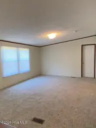 1951 Stanley Road SW, Supply, NC 28462 — 4-bedroom manufactured home, Supply, NC, photo 6 of 27: Back Lvrm