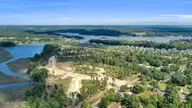 119 Delphi Trace, Hampstead, NC 28443 — 4-bedroom waterfront home in Halcyon, Hampstead, NC, photo 7 of 10: HalcyonDrone_06
