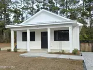 123 Long Pond Loop, Swansboro, NC 28584 — 2-bedroom waterfront condo in Cabins at Old Horse, Swansboro, NC, photo 1 of 52