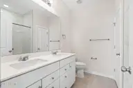 9414 Barnstormer Drive, Carolina Shores, NC 28467 — 3-bedroom waterfront home in Eagle Run, Carolina Shores, NC, photo 21 of 41: Primary Bathroom