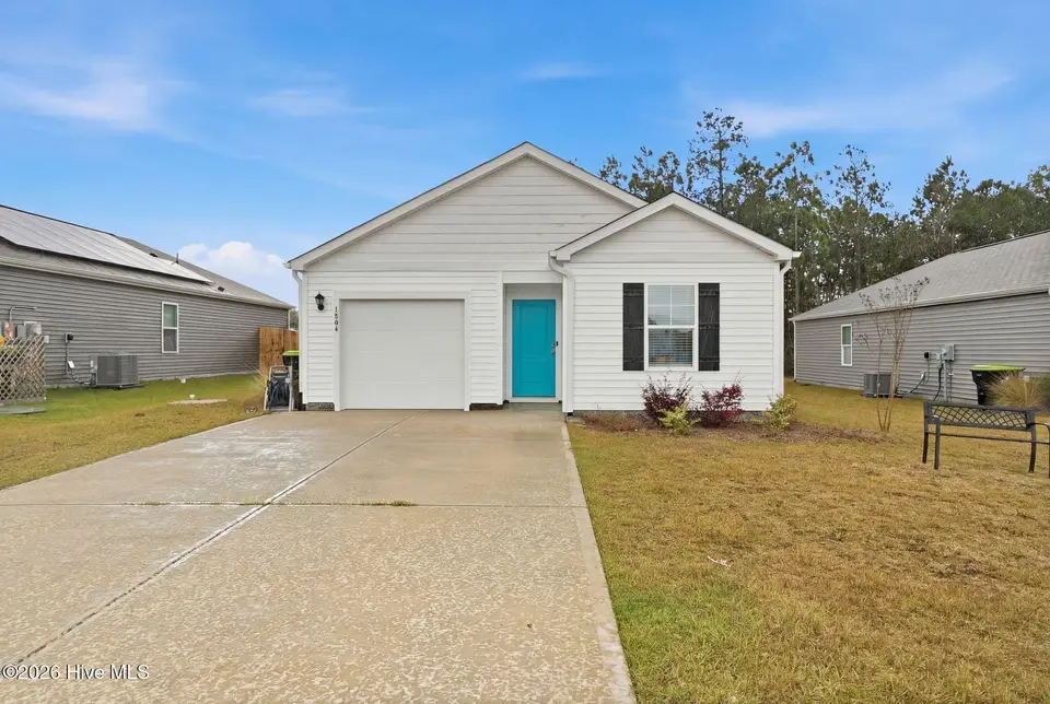 1804 Willowtree Court SE, Bolivia, NC 28422 — 4-bedroom home in Bella Point, Bolivia, NC, photo 1 of 33: Front of Home