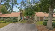 84 Quarterdeck Townes, New Bern, NC 28562 — 3-bedroom waterfront townhome in River Bend, New Bern, NC, photo 6 of 46: 1-web-or-mls-DJI_20251014110913_0524_D