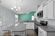 130 Fodder Drive, Hubert, NC 28539 — 3-bedroom home in Ole Mill Village, Hubert, NC, photo 10 of 24: 14_kitchen