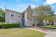 717 Bragg Drive Apt F, Wilmington, NC 28412 — 2-bedroom condo in Hampton Place, Wilmington, NC, photo 1 of 27: 3_front exterior