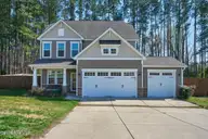215 Farmhouse Lane, Carthage, NC 28327 — 4-bedroom home in Meadows at Farm Life, Carthage, NC, photo 1 of 55: 03-11_215 Farmhouse Ln., Carthage, NC 28