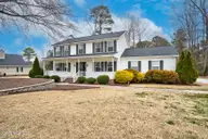 100 Laurel Spring Drive, Nashville, NC 27856 — 4-bedroom home in South Creek, Nashville, NC, photo 1 of 38: front