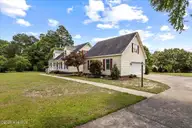 106 Yelverton Place, Goldsboro, NC 27530 — 3-bedroom home in Ashby Hills, Goldsboro, NC, photo 5 of 42: Garage Side View