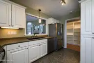 2010 Fairways West Drive, New Bern, NC 28562 — 2-bedroom home in Greenbrier, New Bern, NC, photo 11 of 37: Kitchen with Stainless Steel Appliances