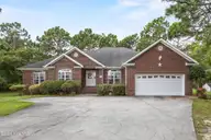 124 Maypop Lane, Wilmington, NC 28412 — 4-bedroom home in River Oaks, Wilmington, NC, photo 1 of 46
