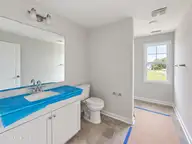 57 W Emily Gardens Drive, Selma, NC 27576 — 4-bedroom home in Emily Gardens, Selma, NC, photo 16 of 18