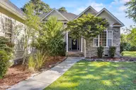 707 N Green Tee Road, Hampstead, NC 28443 — 3-bedroom waterfront home in Olde Point, Hampstead, NC, photo 4 of 62: 6_front pathway