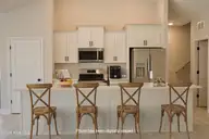63 Waterfall Lane, Whiteville, NC 28472 — 4-bedroom waterfront home in Waterfall Estates, Whiteville, NC, photo 15 of 22: Kitchen 2