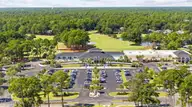 620 Eastwood Park Road Unit 6a, Sunset Beach, NC 28468 — 4-bedroom townhome in Sea Trail Plantation, Sunset Beach, NC, photo 10 of 73: 66-web-or-mls-DJI_20260929115911_0953_D