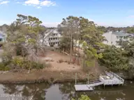 103 SE 27th Street, Oak Island, NC 28465 — 3-bedroom waterfront home, Oak Island, NC, photo 12 of 56: 8-web-or-mls-DJI_20260302112830_0292_D