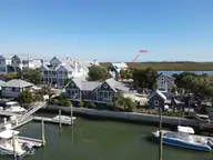 84 Keelson Row, Bald Head Island, NC 28461 — 1-bedroom waterfront home in BHI Harbour Village, Bald Head Island, NC, photo 6 of 22: dji_fly_20261026_143046_168_179303951606