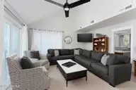 1707 S Shore Drive, Surf City, NC 28445 — 3-bedroom waterfront home in White Hills Beach, Surf City, NC, photo 15 of 65: living-room-01d