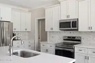 361 Thimbleberry Drive, Vass, NC 28394 — 4-bedroom home in Woodlake, Vass, NC, photo 18 of 59: Kitchen