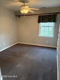 102 Dockside Drive, Jacksonville, NC 28546 — 4-bedroom waterfront home in Hunters Creek, Jacksonville, NC, photo 16 of 33: bedroom 2