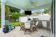 1620 Harbour Place Drive, Calabash, NC 28467 — 3-bedroom home in Kingfish Bay, Calabash, NC, photo 15 of 75: Backyard Lanai