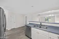 3967 Winds Ridge Drive, Wilmington, NC 28409 — 3-bedroom townhome in Winds Ridge, Wilmington, NC, photo 9 of 54: 10_kitchen