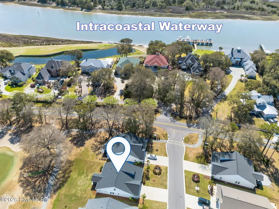 2086 Greenside Manor Drive SW, Ocean Isle Beach, NC 28469 — 4-bedroom home in The Greenside Manors, Ocean Isle Beach, NC, photo 1 of 59: Greenside Manor
