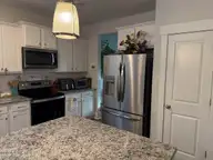 122 Ballantine Grove Lane, Newport, NC 28570 — 4-bedroom home in Ballantine Grove, Newport, NC, photo 9 of 21: Kitchen A