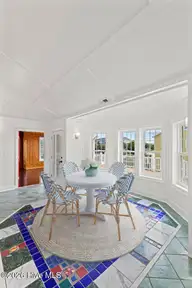 9813 Sandy Court, Emerald Isle, NC 28594 — 4-bedroom waterfront home in Dolphin Ridge, Emerald Isle, NC, photo 13 of 67: 425A6104-dining_Final
