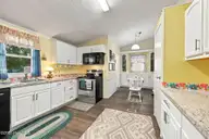 206 Champion Drive, Hampstead, NC 28443 — 3-bedroom manufactured home in Topsail Greens, Hampstead, NC, photo 14 of 37