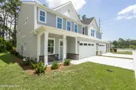 304 Lusterleaf Lane #2, Shallotte, NC 28470 — 3-bedroom townhome in Rourk Woods, Shallotte, NC, photo 3 of 29: front.3